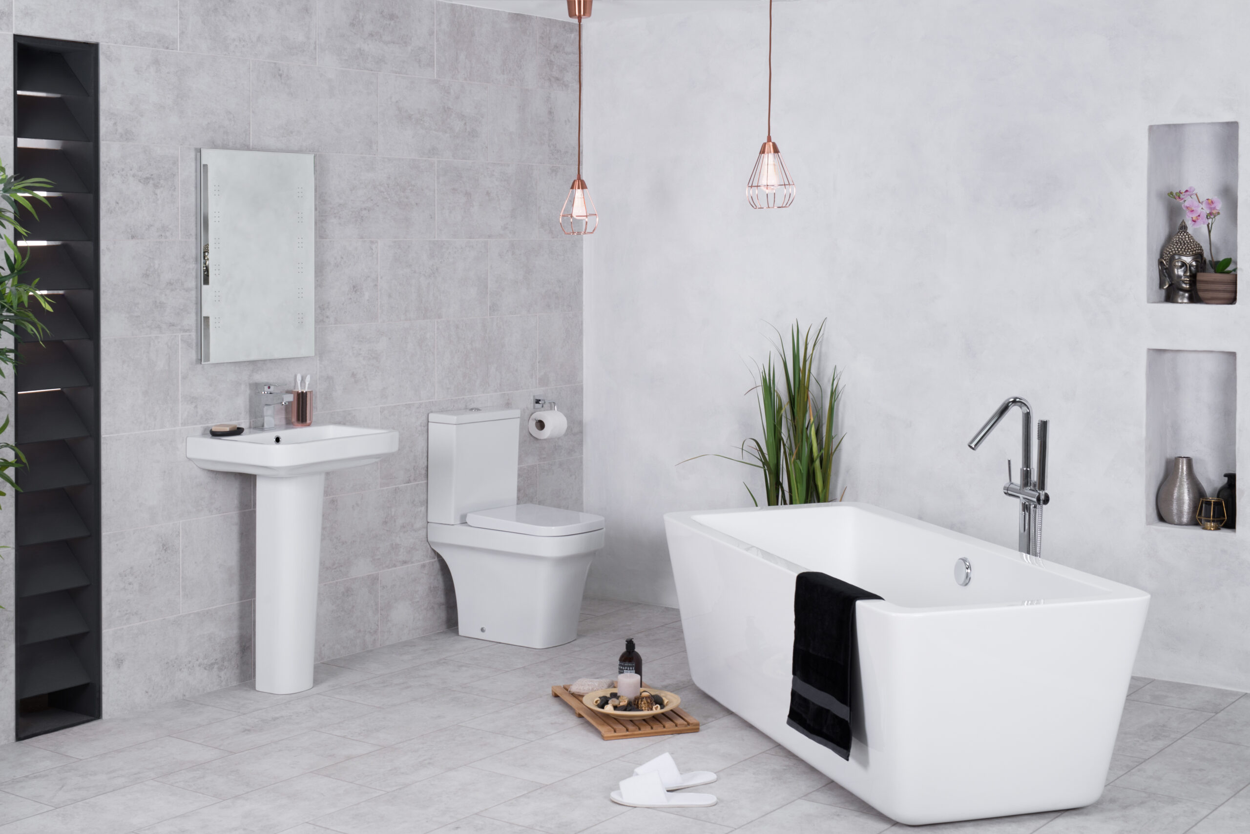 A modern bathroom with a toilet and bathtub